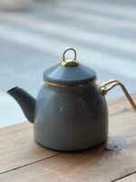 Pava enlosada gris con detalles dorados – 2,8 litros