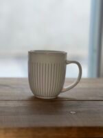 TAZA RAYA CON DISEÑO Y GUARDA